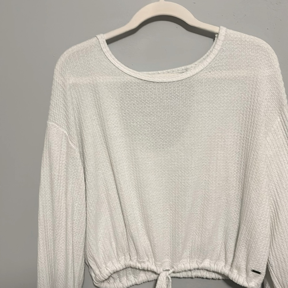 white tie sweater with gap in back